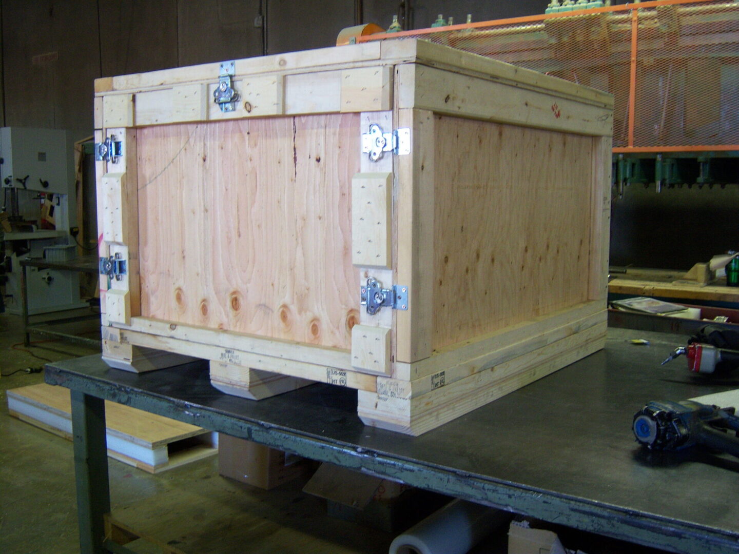 A wooden crate sitting on top of a table.